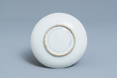 A Chinese blue and white ko-sometsuke plate with three playing boys for the Japanese market, Transitional period