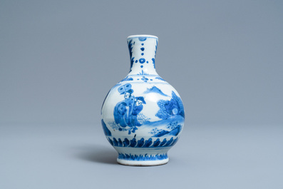 A Chinese blue and white ewer with figures in a landscape, Transitional period