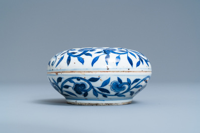 A pair of Chinese blue and white four-tier stacking boxes, a seal paste box and four saucers, 19th C.