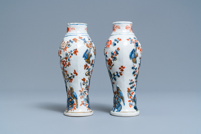 A Chinese famille verte dish and a pair of Imari-style relief-molded vases, Kangxi