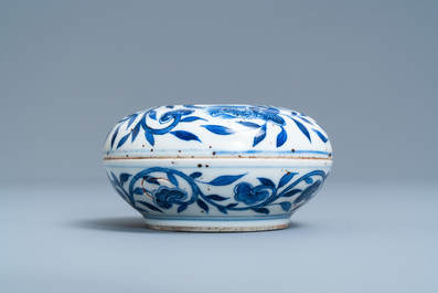 A pair of Chinese blue and white four-tier stacking boxes, a seal paste box and four saucers, 19th C.