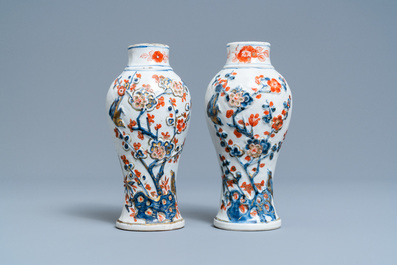 A Chinese famille verte dish and a pair of Imari-style relief-molded vases, Kangxi