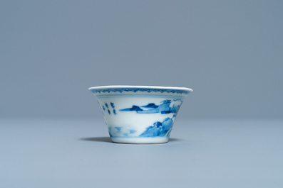 A Chinese blue and white inscribed wine cup, Kangxi