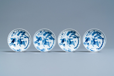 A pair of Chinese blue and white four-tier stacking boxes, a seal paste box and four saucers, 19th C.