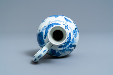 A Chinese blue and white ewer with figures in a landscape, Transitional period