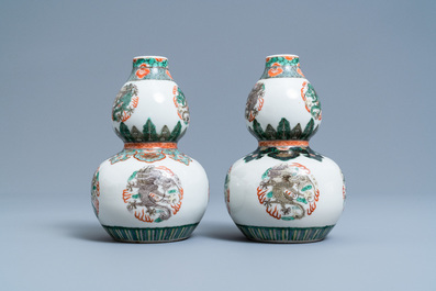 A pair of Chinese famille verte double gourd 'dragon' vases, 19th C.