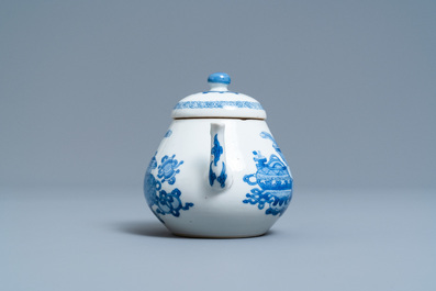 A Chinese blue and white teapot and cover with antiquities, Jiajing mark, Kangxi
