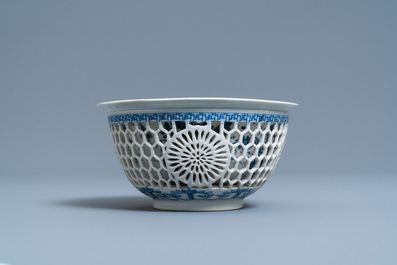 A Chinese blue and white reticulated double-walled bowl, Kangxi