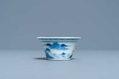 A Chinese blue and white inscribed wine cup, Kangxi