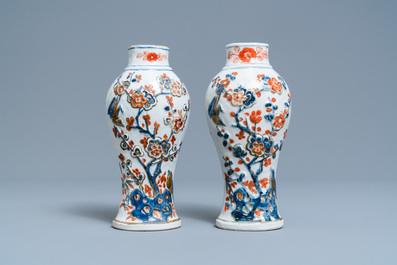 A Chinese famille verte dish and a pair of Imari-style relief-molded vases, Kangxi