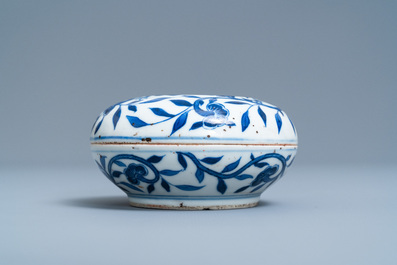 A pair of Chinese blue and white four-tier stacking boxes, a seal paste box and four saucers, 19th C.