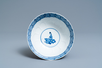 A Chinese blue and white lotus-molded 'playing boys' bowl, Chenghua mark, Kangxi