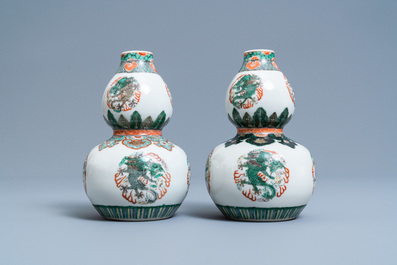A pair of Chinese famille verte double gourd 'dragon' vases, 19th C.