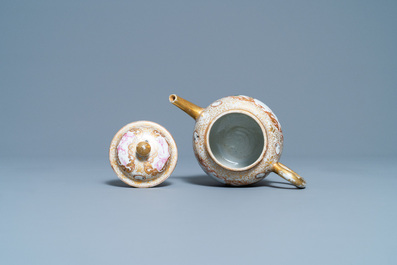 A Chinese gilded famille rose 'Mongolian hunt' teapot on stand, Qianlong