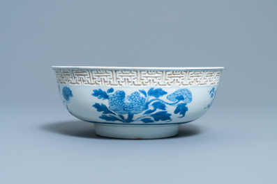 A Chinese blue and white relief-molded bowl, Kangxi