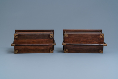 A pair of rectangular Chinese three-tiered hongmu wooden covered boxes, 19th C.