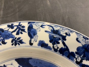 A Chinese blue and white dish with ladies around a jardini&egrave;re, Kangxi