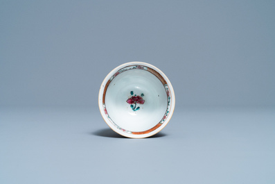 A Chinese reticulated double-walled famille rose cup and saucer, Yongzheng