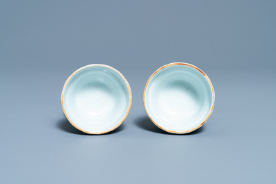 A pair of Chinese blue and white rococo-style tripod salts, Qianlong