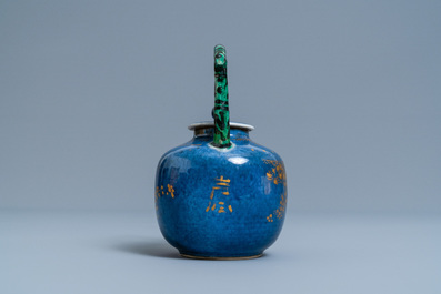 A Chinese powder blue and gilt teapot with verte biscuit handle, Kangxi