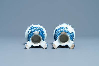 A pair of Chinese blue and white rococo-style tripod salts, Qianlong