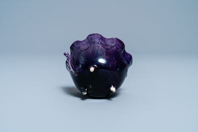 A Chinese aubergine- and turquoise-glazed 'lotus' trick cup, Kangxi