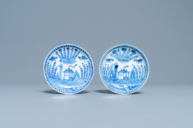 A pair of Chinese blue and white cups and saucers, Kangxi