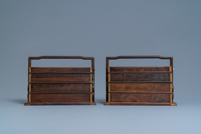 A pair of rectangular Chinese three-tiered hongmu wooden covered boxes, 19th C.
