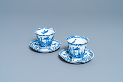 A pair of Chinese blue and white cups and saucers, Kangxi