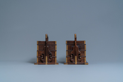 A pair of rectangular Chinese three-tiered hongmu wooden covered boxes, 19th C.