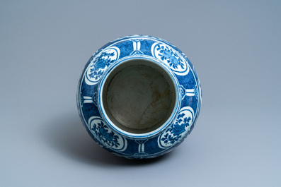 A Chinese blue and white vase with floral panels, Wanli
