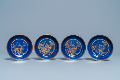 Four Chinese gilt-decorated blue-ground cups and saucers with fine landscapes, Qianlong