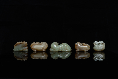 Five Chinese celadon and russet jade carvings, 19th C.