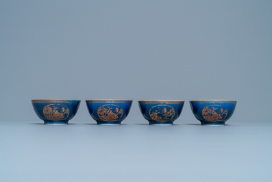 Four Chinese gilt-decorated blue-ground cups and saucers with fine landscapes, Qianlong