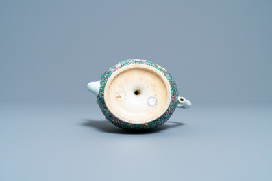 A Chinese famille rose peach-shaped 'cadogan' teapot with applied floral design, Qianlong