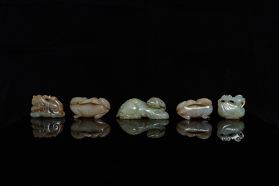 Five Chinese celadon and russet jade carvings, 19th C.