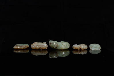 Five Chinese celadon and russet jade carvings, 19th C.
