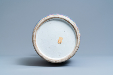 A Chinese famille rose blue-ground vase, 19th C.