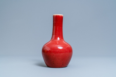 A Chinese monochrome sang de boeuf-glazed bottle vase, 19th C.