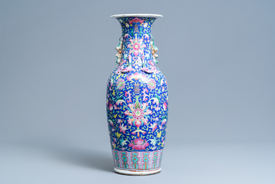 A Chinese famille rose blue-ground vase, 19th C.