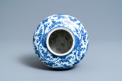 A Chinese blue and white lotus scroll vase, Xuande mark, Kangxi