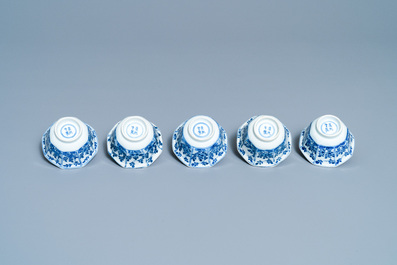 Five Chinese blue and white cups and saucers, Kangxi mark, 19th C.