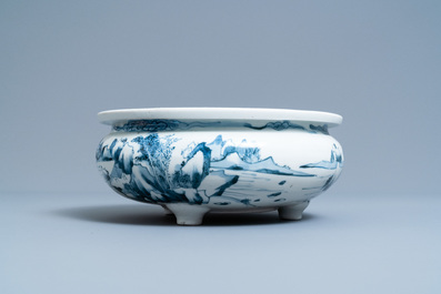 A Chinese blue and white tripod censer with a landscape, Dehua, Kangxi