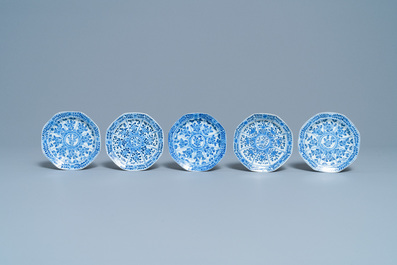 Five Chinese blue and white cups and saucers, Kangxi mark, 19th C.