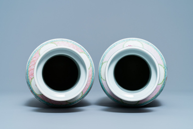 A pair of Chinese famille rose rouleau vases with immortals, 19/20th C.