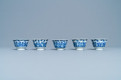 Five Chinese blue and white cups and saucers, Kangxi mark, 19th C.