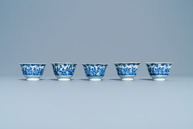 Five Chinese blue and white cups and saucers, Kangxi mark, 19th C.