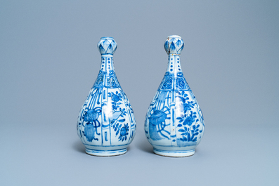 A pair of Chinese blue and white garlic-mouth bottle vases, Wanli