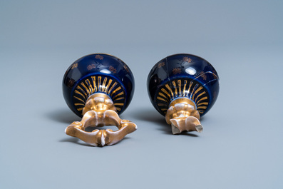 A pair of S&egrave;vres-style vases and covers, prob. Samson, Paris, 19th C.