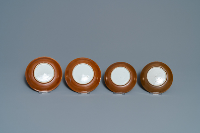 Eight Chinese famille rose, blue and white and iron-red capucin-ground cups and saucers, Kangxi/Qianlong